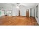 Inviting living room with hardwood floors, neutral walls, and an open layout to the kitchen at 4323 Crow Rd, Monroe, NC 28112
