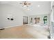 Large living room with access to kitchen and view of the garden at 4323 Crow Rd, Monroe, NC 28112