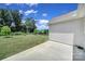 Relaxing backyard shows a nice yard, concrete patio and green tree line in distance at 440 Shallowford Dr, Rock Hill, SC 29732