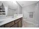 Bathroom with white tiled floors, shower and vanity at 440 Shallowford Dr, Rock Hill, SC 29732