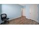 Bedroom with light blue walls and hardwood floors at 440 Shallowford Dr, Rock Hill, SC 29732