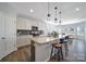 Bright, open kitchen featuring a large island, stainless steel appliances, and stylish pendant lighting at 440 Shallowford Dr, Rock Hill, SC 29732