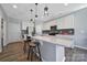 Modern kitchen with bright, white cabinets, quartz countertops, and stainless steel appliances at 440 Shallowford Dr, Rock Hill, SC 29732