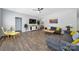Spacious living room with dark wood floors, a ceiling fan, and bright, neutral paint at 440 Shallowford Dr, Rock Hill, SC 29732