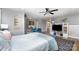 Open bedroom floor plan that flows into a living room with fireplace and a view into the bathroom at 501 Mercury St, Charlotte, NC 28205
