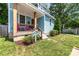 Inviting covered front porch features comfortable seating and decorative landscaping at 501 Mercury St, Charlotte, NC 28205