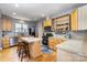 Eat-in kitchen with a center island and stainless steel appliances at 501 Mercury St, Charlotte, NC 28205