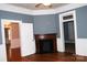 Inviting living room with a classic fireplace, showcasing the home's historic charm at 510 5Th St, Spencer, NC 28159
