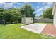 Large backyard with a utility shed and a concrete pad at 5701 Cedar Hill Dr, Monroe, NC 28110