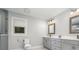 Bright bathroom featuring double vanity, and a toilet at 5701 Cedar Hill Dr, Monroe, NC 28110
