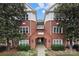 Attractive brick apartment building with well-maintained landscaping at 5730 Closeburn Rd # N, Charlotte, NC 28210