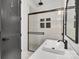 Sleek bathroom featuring a modern shower and vanity with a clean and elegant design at 6327 Fox Tail Ln, Davidson, NC 28036