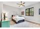 Cozy bedroom with neutral decor, carpet floors, and natural light creates a calming space at 6327 Fox Tail Ln, Davidson, NC 28036