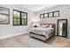 Bright bedroom with plush carpet, neutral walls, and natural light offers a comfortable retreat at 6327 Fox Tail Ln, Davidson, NC 28036