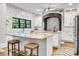 Modern kitchen boasting an island, stainless steel appliances, and stylish backsplash at 6327 Fox Tail Ln, Davidson, NC 28036
