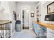Cozy office space with built-in shelves and a natural wood desk, creating an ideal work-from-home environment at 6327 Fox Tail Ln, Davidson, NC 28036