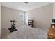 Spacious bedroom with neutral tones, suitable for exercise equipment or flexible use at 732 Wood Lily Dr, Belmont, NC 28012