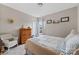 Cozy bedroom featuring a comfortable bed, soft carpet, and natural light from the window at 732 Wood Lily Dr, Belmont, NC 28012