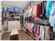 Large walk-in closet with custom shelving, hanging racks, and ample storage space for clothes and accessories at 732 Wood Lily Dr, Belmont, NC 28012