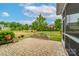 Beautiful brick patio with a raised garden bed, offering a charming outdoor space for relaxation and entertaining at 732 Wood Lily Dr, Belmont, NC 28012