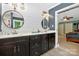 Bathroom featuring double vanities, modern fixtures, and contemporary design at 8300 Quarters Ln, Mint Hill, NC 28227
