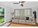 Comfortable living room with large sofa, soft lighting, and hardwood floors at 8300 Quarters Ln, Mint Hill, NC 28227