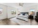 Spacious primary bedroom with large windows, neutral walls, and a decorative rug at 837 Kathy Dianne Dr, Indian Land, SC 29707