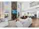 Spacious living room featuring a floor-to-ceiling stone fireplace and an open floor plan at 837 Kathy Dianne Dr, Indian Land, SC 29707
