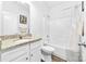 Bright bathroom featuring a tub and granite countertops at 8416 Highgate Dr, Charlotte, NC 28215