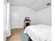 Comfortable bedroom with wood floors, a fireplace, and neutral decor at 8416 Highgate Dr, Charlotte, NC 28215