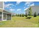 Expansive backyard, perfect for entertaining, framed by trees at 8420 Golden Stone Ln # 138, Fort Mill, SC 29707