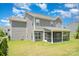 Beautiful home exterior with a screened porch and well-manicured lawn at 8420 Golden Stone Ln # 138, Fort Mill, SC 29707