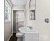 Small bathroom featuring modern vanity and white walls at 904 Edgewood Cir, Gastonia, NC 28052