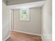 Hallway with a window with green foliage outside at 904 Edgewood Cir, Gastonia, NC 28052