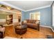 Hardwood floors in the living room offer transition to other areas of the home at 9212 John Hawks Rd, Cornelius, NC 28031