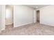 Empty bedroom with plush carpeting, bright windows, and ample space for relaxation and personalization at 9221 Widden Way, Charlotte, NC 28269