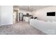 Open-concept living room showcases modern finishes, with seamless flow into the adjacent kitchen area at 9221 Widden Way, Charlotte, NC 28269