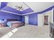 Huge bedroom with large windows, ceiling fan, ensuite, and plush carpet at 9429 Coast Laurel Nw Ave, Concord, NC 28027