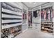 Large walk-in closet with custom shelves and storage at 9429 Coast Laurel Nw Ave, Concord, NC 28027