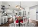 Large dining room area with kitchen and updated lighting at 9429 Coast Laurel Nw Ave, Concord, NC 28027