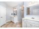 Bathroom featuring double vanities, tile flooring, and modern lighting at 101 Harvest Farm Ct, Mount Holly, NC 28120