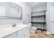 Traditional bathroom with large mirror and shower at 101 Harvest Farm Ct, Mount Holly, NC 28120