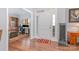 Welcoming foyer with hardwood floors, adjacent to the office and featuring a decorative fountain at 101 Harvest Farm Ct, Mount Holly, NC 28120