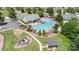 Aerial view of a community pool, playground, and recreational area at 101 Harvest Farm Ct, Mount Holly, NC 28120