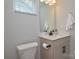 Well-lit bathroom with a modern vanity, neutral color palette, and practical layout at 10209 Mamillion Dr, Huntersville, NC 28078