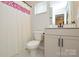 Modern bathroom with a sleek vanity, contemporary fixtures, and a bright, clean design at 10209 Mamillion Dr, Huntersville, NC 28078