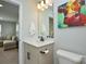 Half bathroom features a sink and a toilet at 10209 Mamillion Dr, Huntersville, NC 28078