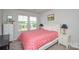 Bright bedroom with large windows, offering ample natural light and a cozy atmosphere at 10209 Mamillion Dr, Huntersville, NC 28078
