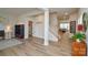 Bright and open entryway with hardwood floors, staircase, and stylish decorations at 10209 Mamillion Dr, Huntersville, NC 28078