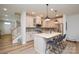 Beautiful kitchen featuring a large island, stainless steel appliances, and sleek modern finishes at 10209 Mamillion Dr, Huntersville, NC 28078